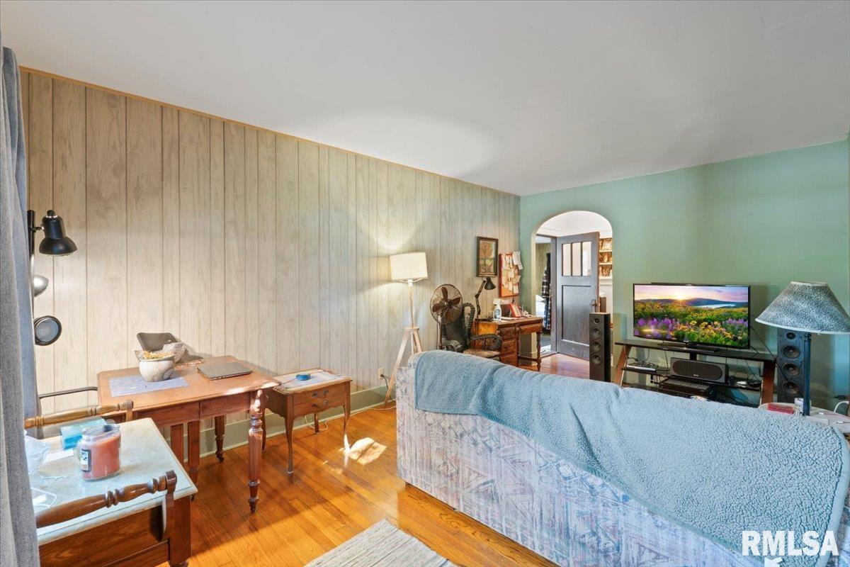 3302 38th Avenue Moline, IL 61265 - Photo 18 of 29 a living room with furniture and a flat screen tv