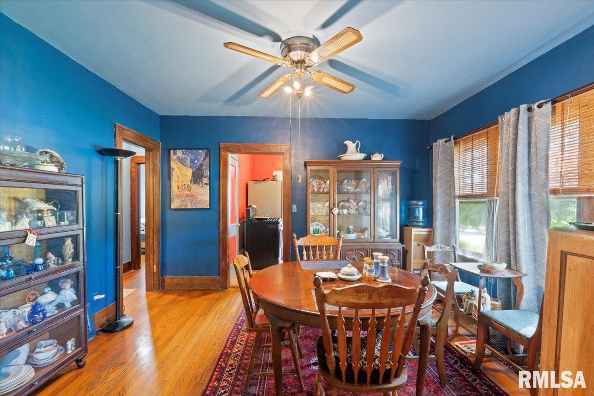 3302 38th Avenue Moline, IL 61265 - Photo 19 of 29 a view of a dining room with furniture window and outside view
