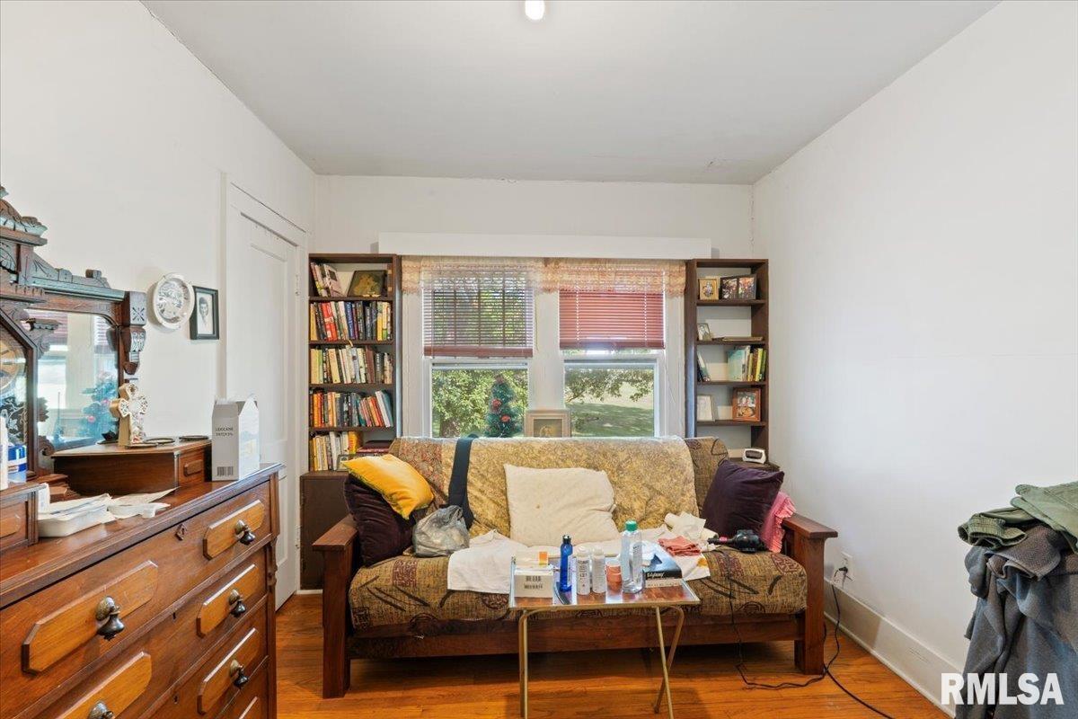 3302 38th Avenue Moline, IL 61265 - Photo 21 of 29 a living room with furniture and a window
