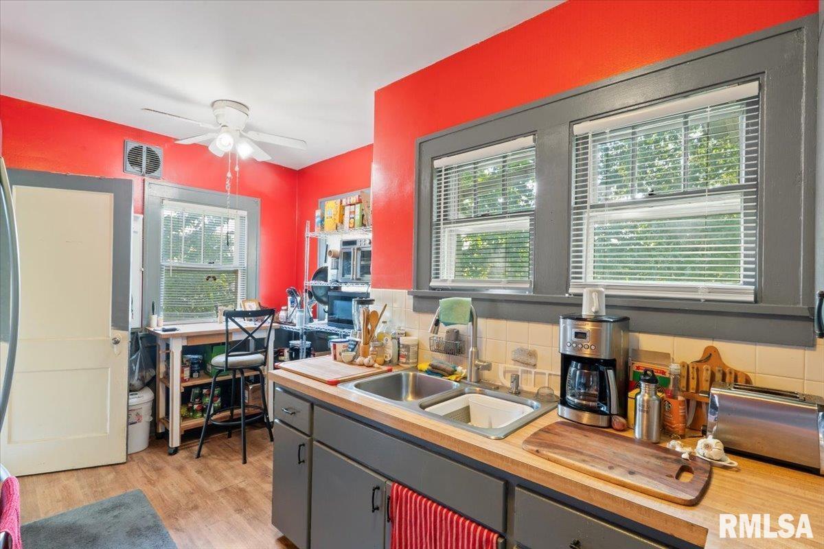 3302 38th Avenue Moline, IL 61265 - Photo 26 of 29 a view of a kitchen and dining room