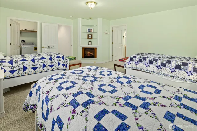 a bedroom with bed and a window