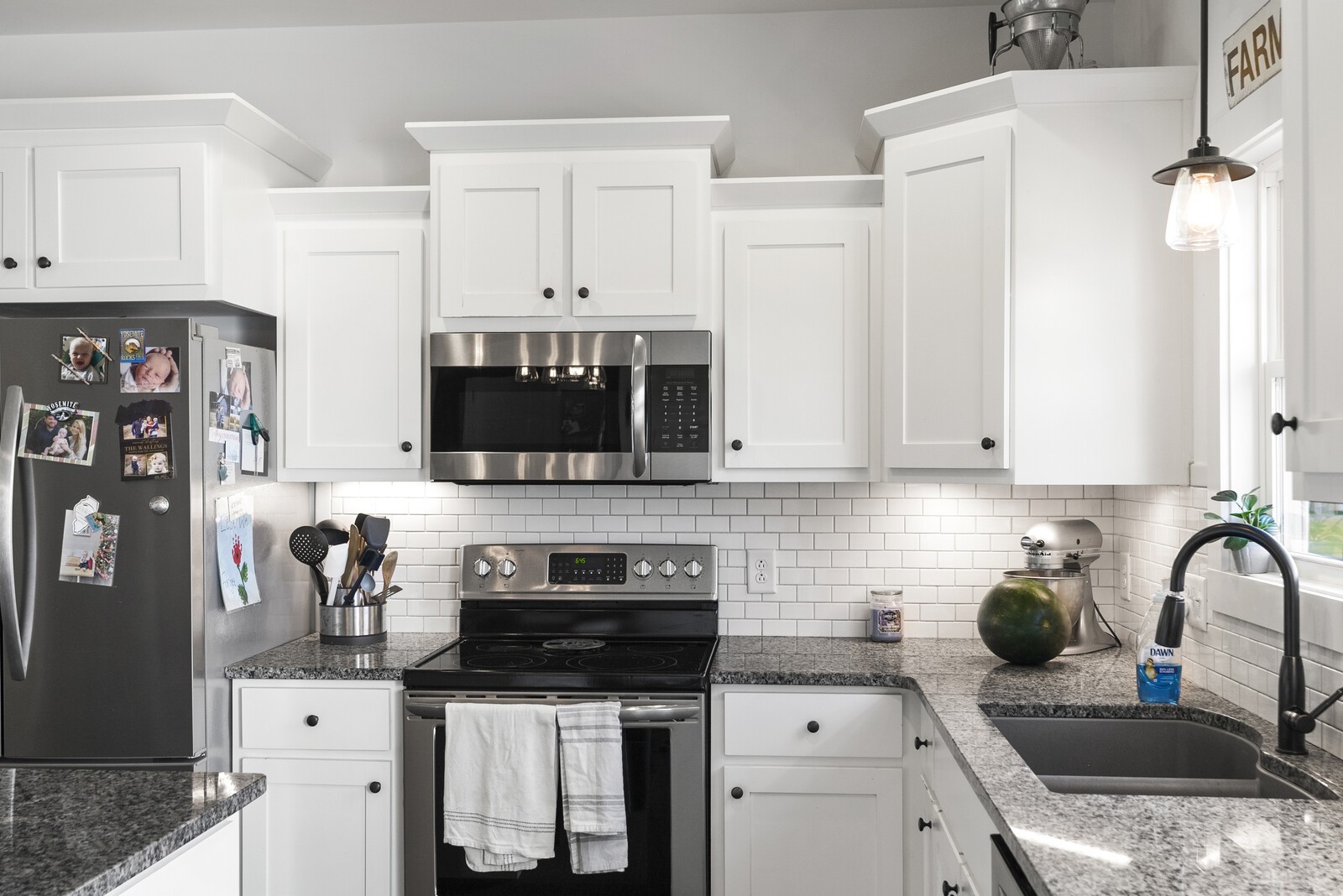 6014 Brown Road Springfield, TN 37172 - Photo 6 of 15 a kitchen with stainless steel appliances granite countertop a sink stove and refrigerator