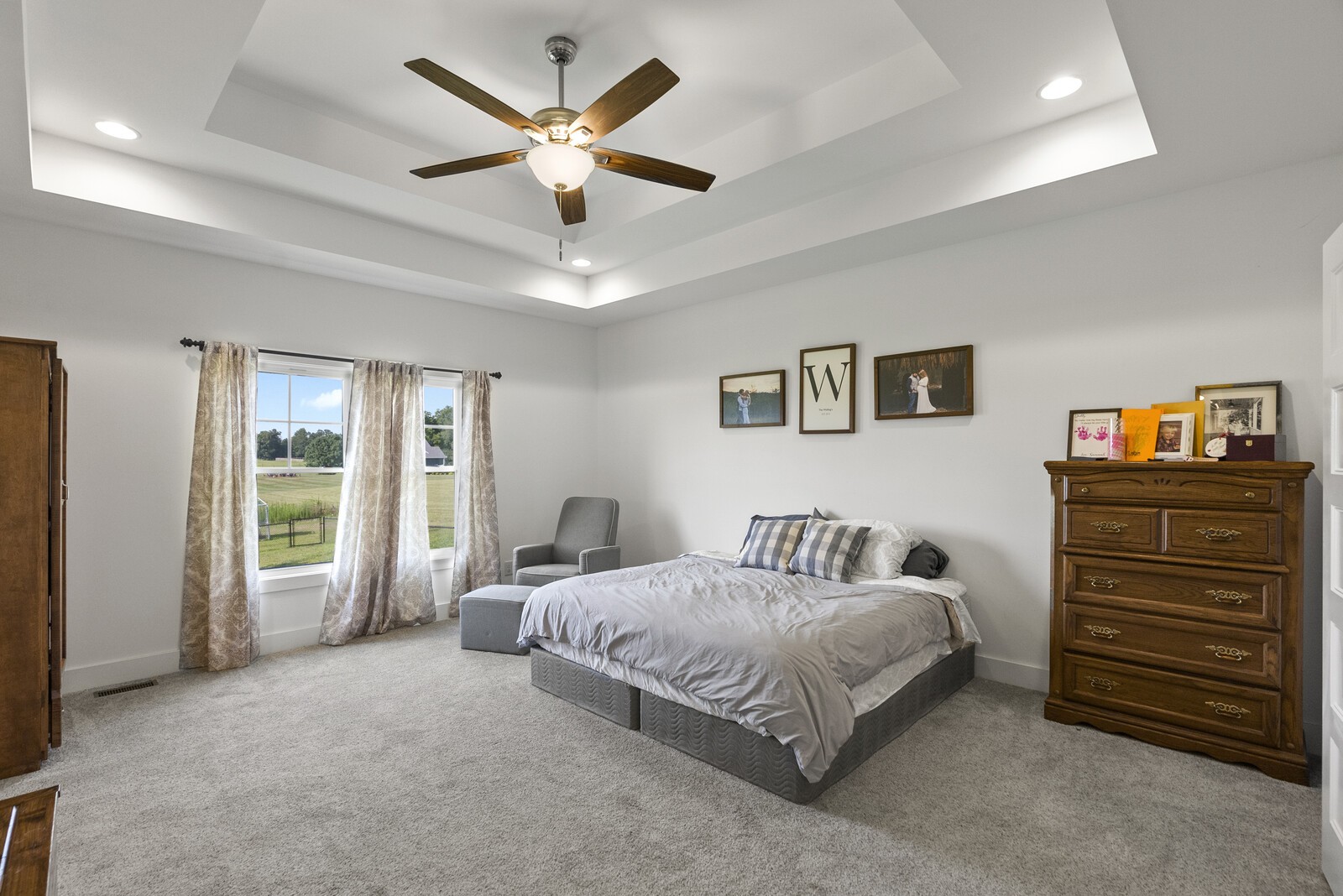 6014 Brown Road Springfield, TN 37172 - Photo 9 of 15 a bedroom with a bed chandelier and a window