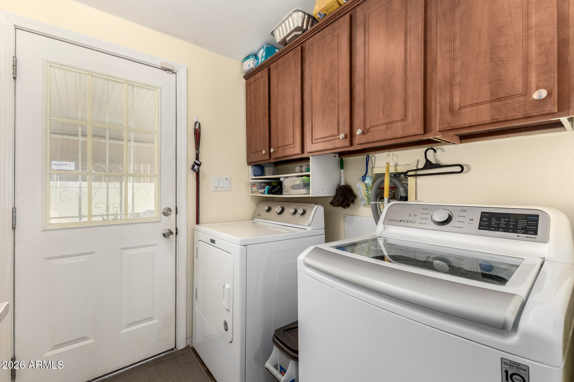 201 South Greenfield Road, Unit 124 Mesa, AZ 85206 - Photo 19 of 31 a utility room with dryer and washer