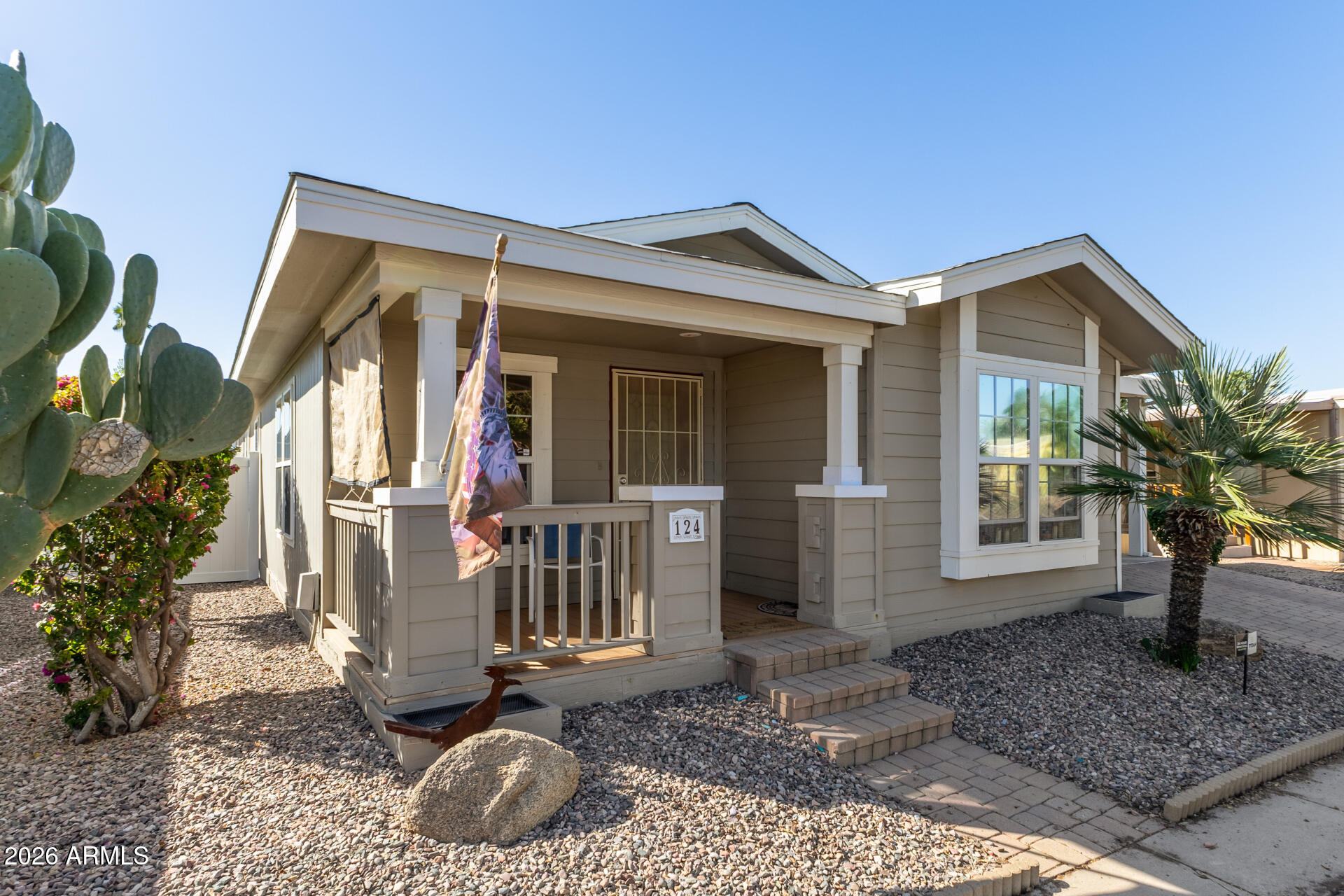 201 South Greenfield Road, Unit 124 Mesa, AZ 85206 - Photo 2 of 31 a view of a house with porch