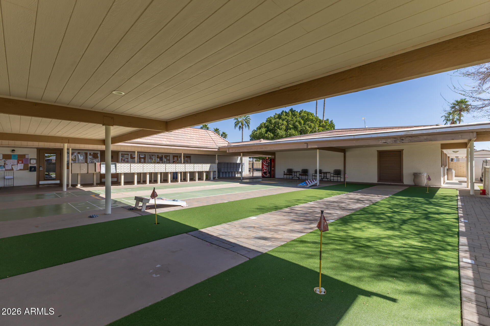 201 South Greenfield Road, Unit 124 Mesa, AZ 85206 - Photo 27 of 31 a front view of a house with a yard