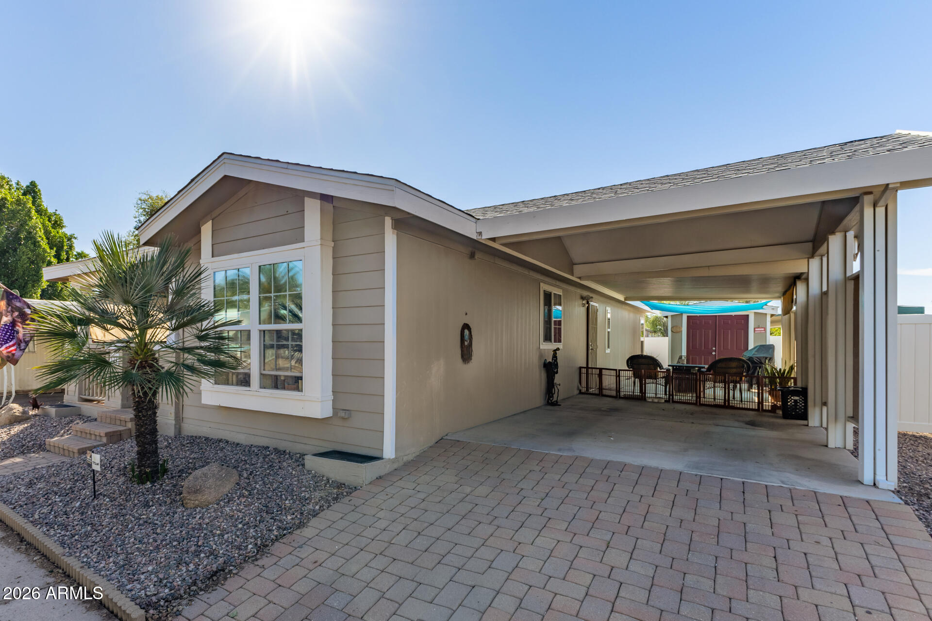 201 South Greenfield Road, Unit 124 Mesa, AZ 85206 - Photo 3 of 31 a view of a house with a porch
