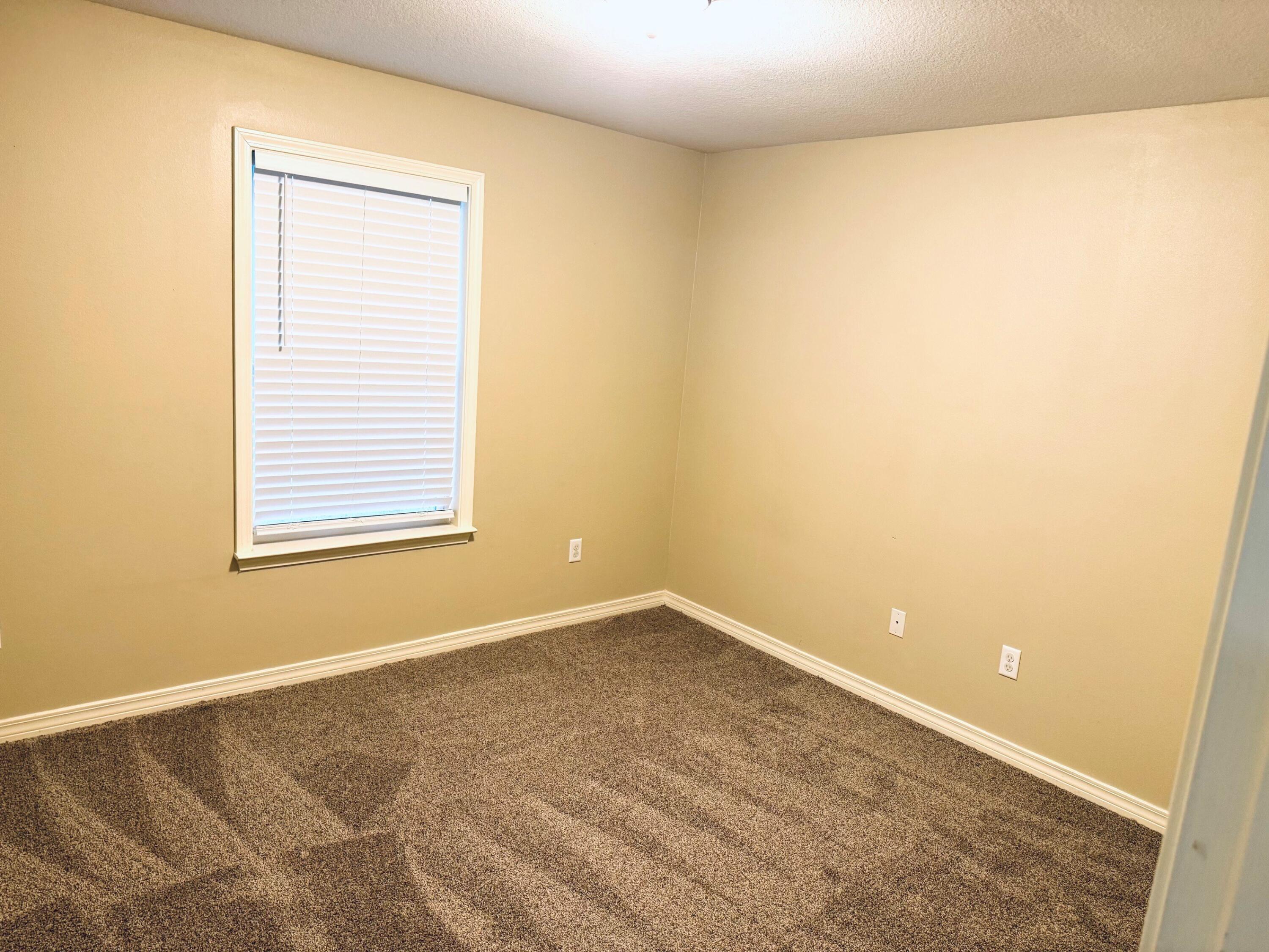 594 Hunters Ridge Road DeFuniak Springs, FL 32433 - Photo 13 of 17 a view of an empty room with a window
