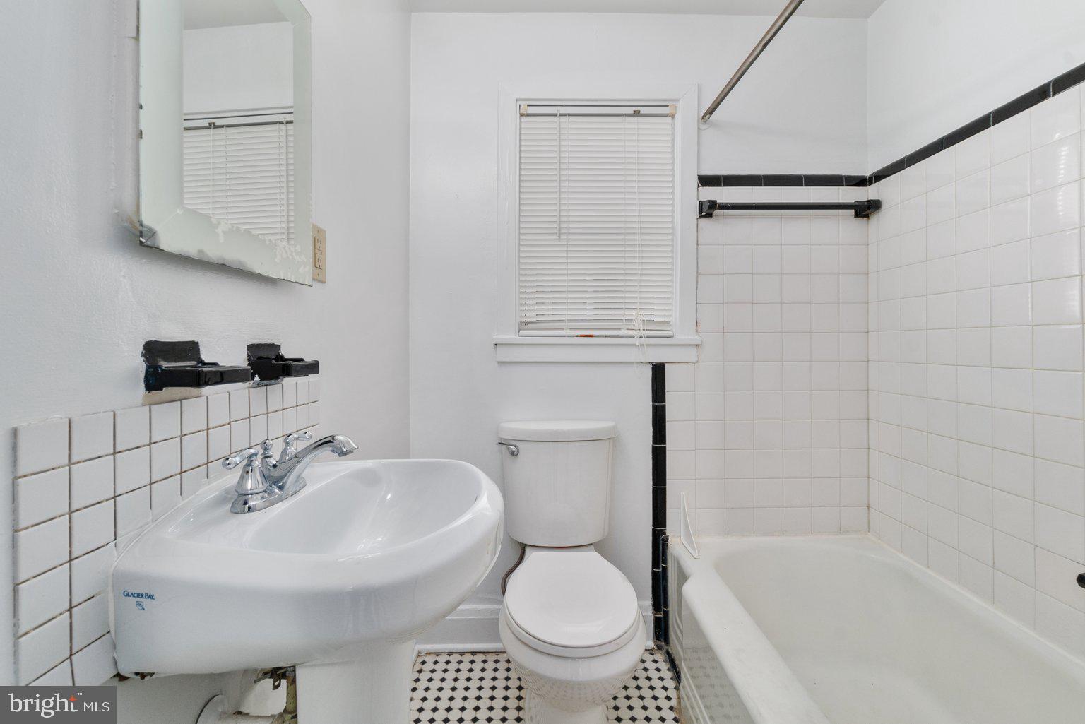 4427 Pen Lucy Road Baltimore, MD 21229 - Photo 22 of 29 Bathroom with Pedestal Sink