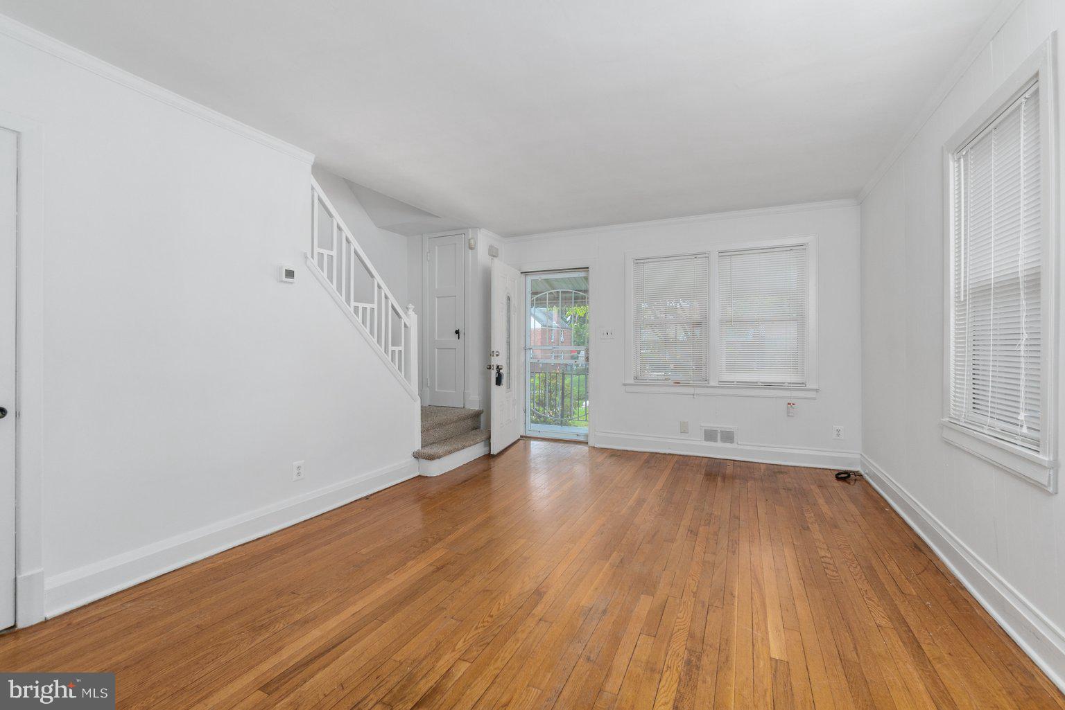 4427 Pen Lucy Road Baltimore, MD 21229 - Photo 6 of 29 Living Room featuring Hardwood Floors