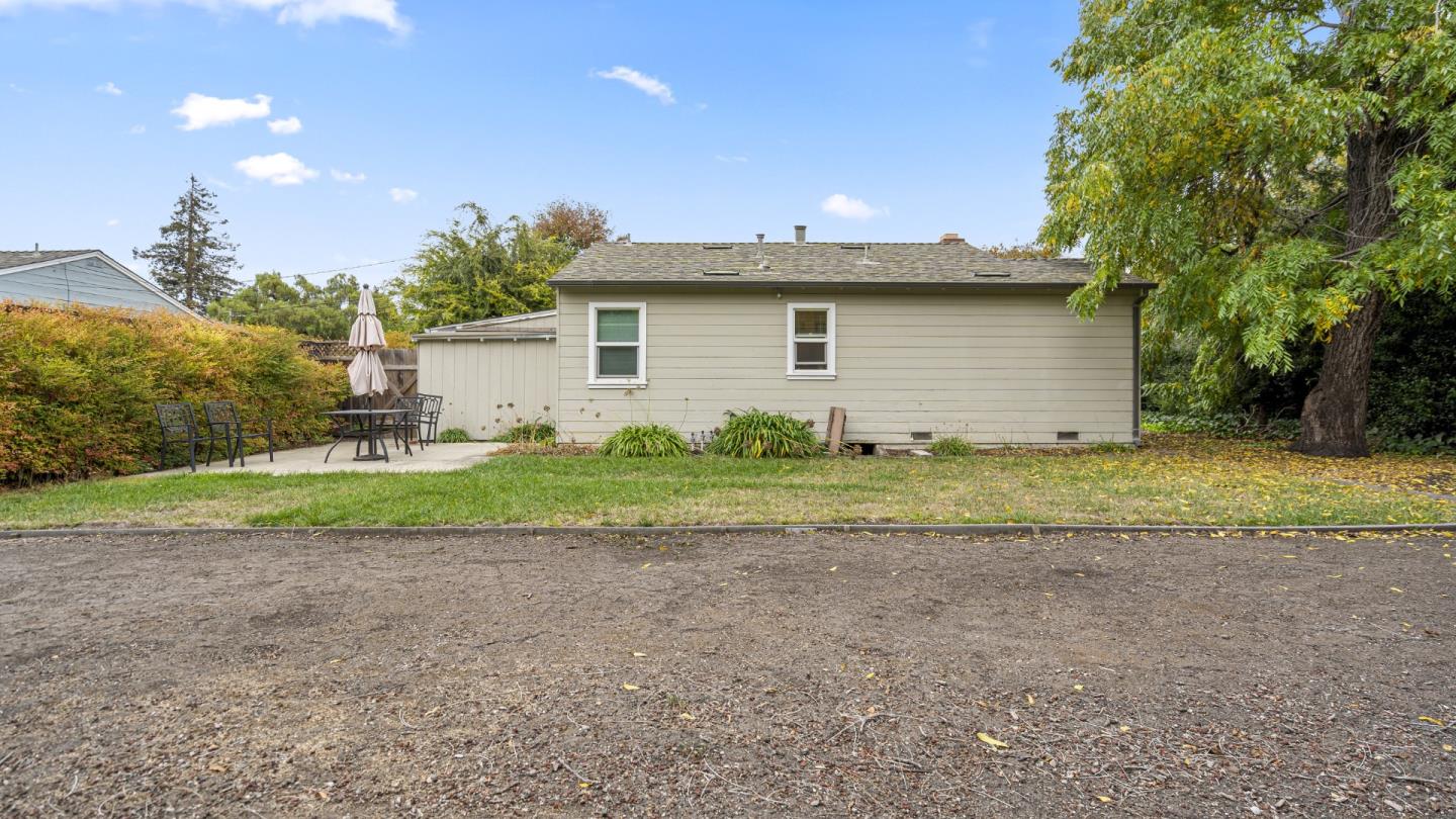 2262 Louis Road Palo Alto, CA 94303 - Photo 28 of 40 a front view of a house with a yard and garage