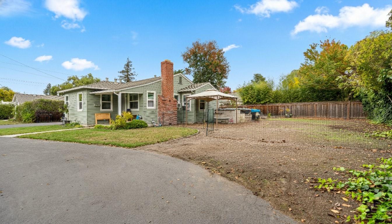 2262 Louis Road Palo Alto, CA 94303 - Photo 33 of 40 a view of a house with a yard and potted plants