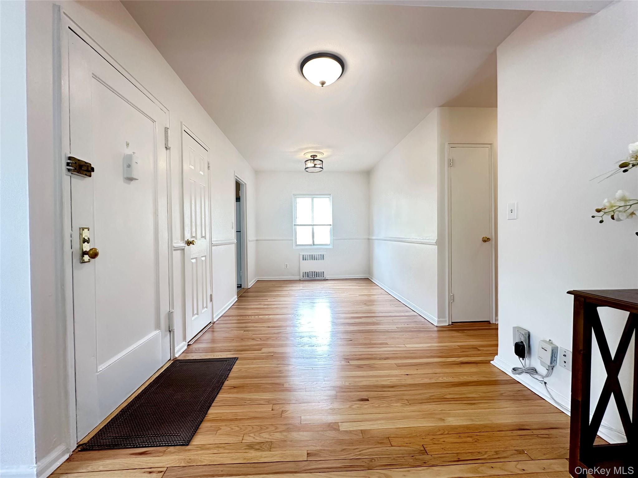 129 Fenimore Road, Unit 129B Mamaroneck, NY 10543 - Photo 3 of 22 Enter unit to living room and dining area.