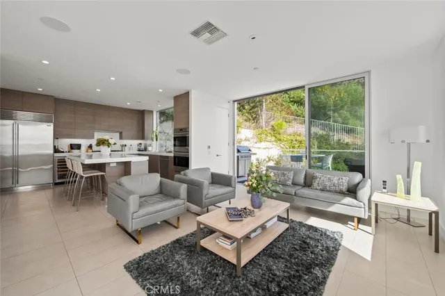 a spacious bedroom with a bed and a couch