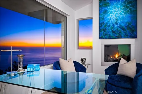 a white bath tub sitting next to a white sink