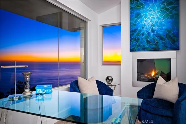 a white bath tub sitting next to a white sink