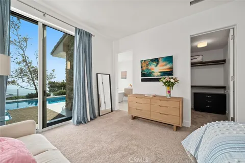 an aerial view of a house with a yard and garden