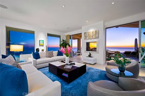 a kitchen with a sink a counter top space and cabinets