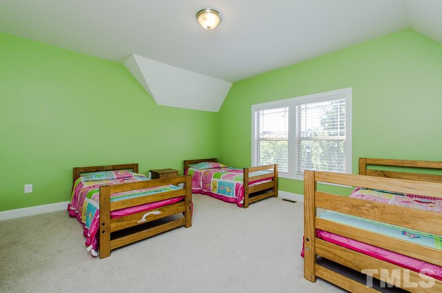 1407 Van Page Boulevard Raleigh, NC 27607 - Photo 17 of 25 a room with pool table and windows