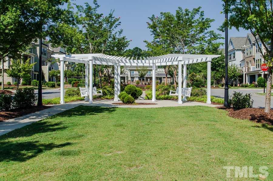 1407 Van Page Boulevard Raleigh, NC 27607 - Photo 24 of 25 front view of a house with a yard