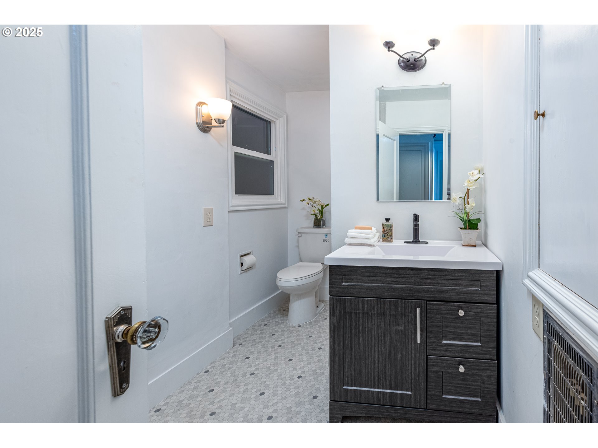 1624 Washington Street Eugene, OR 97401 - Photo 20 of 41 a bathroom with a sink vanity and mirror