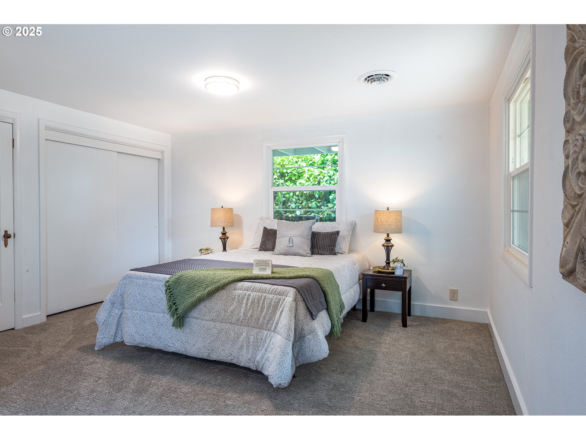 1624 Washington Street Eugene, OR 97401 - Photo 24 of 41 a bedroom with a bed and window