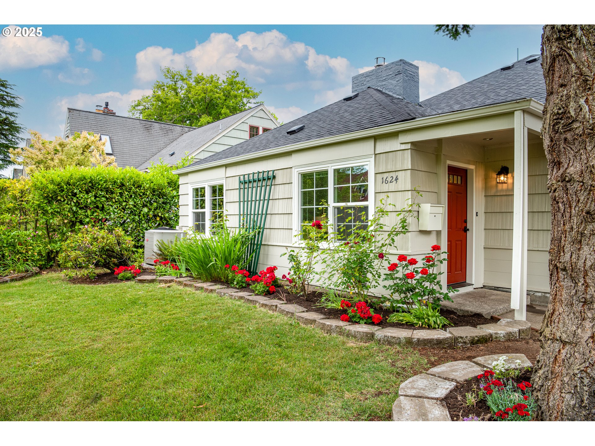 1624 Washington Street Eugene, OR 97401 - Photo 4 of 41 a view of a house with a big yard and potted plants