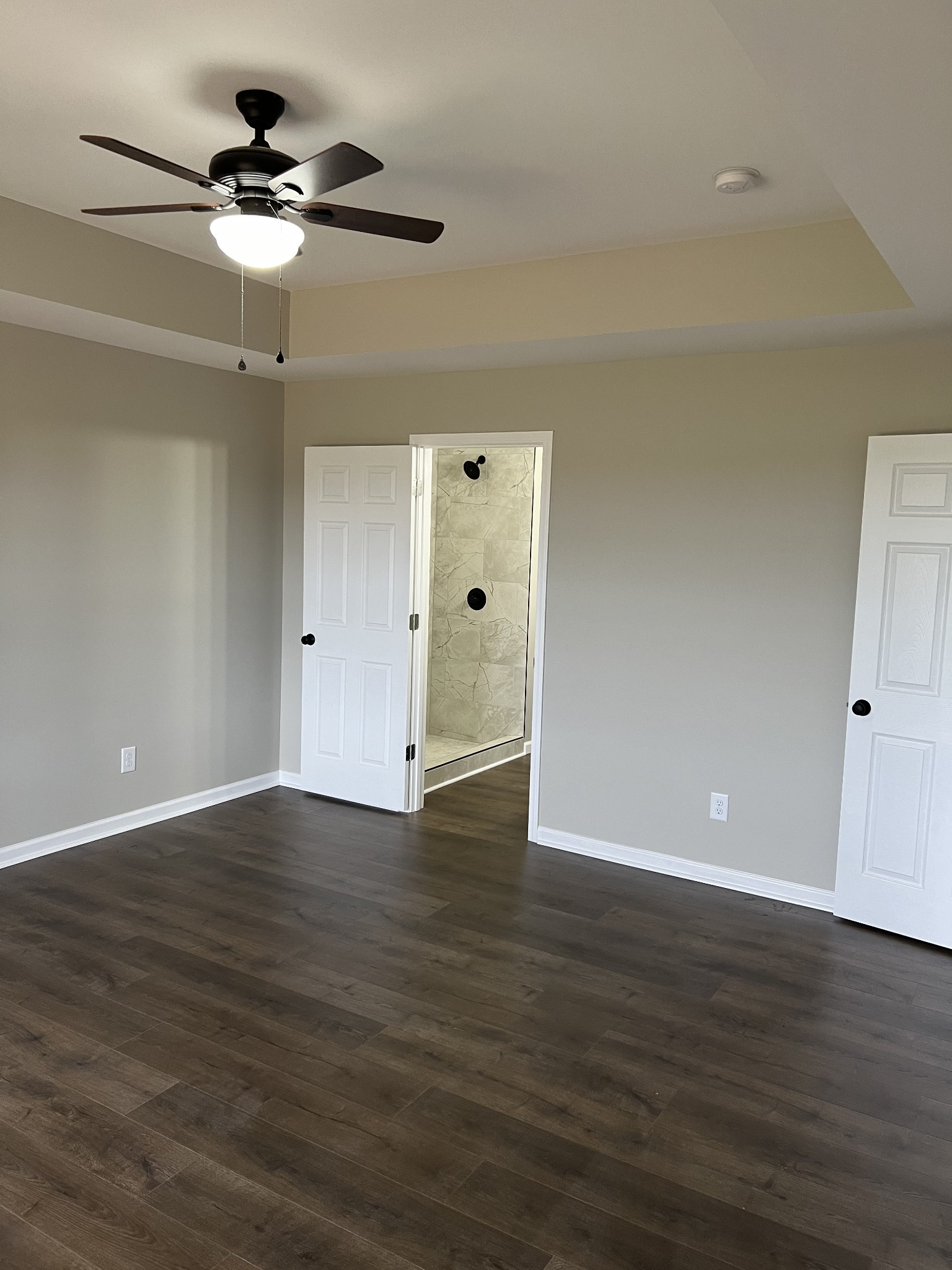1185 Coleytown Road Lafayette, TN 37083 - Photo 11 of 20 a view of an empty room with wooden floor