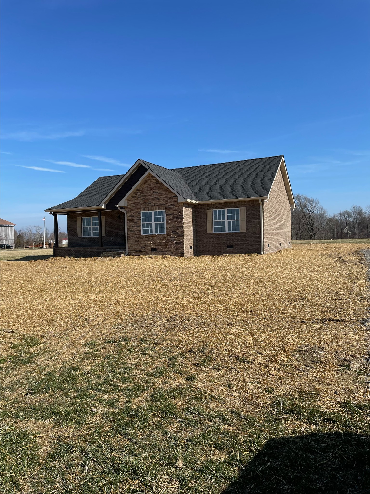1185 Coleytown Road Lafayette, TN 37083 - Photo 2 of 20 a front view of a house with a yard