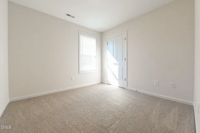 a view of a house with a snow in the yard