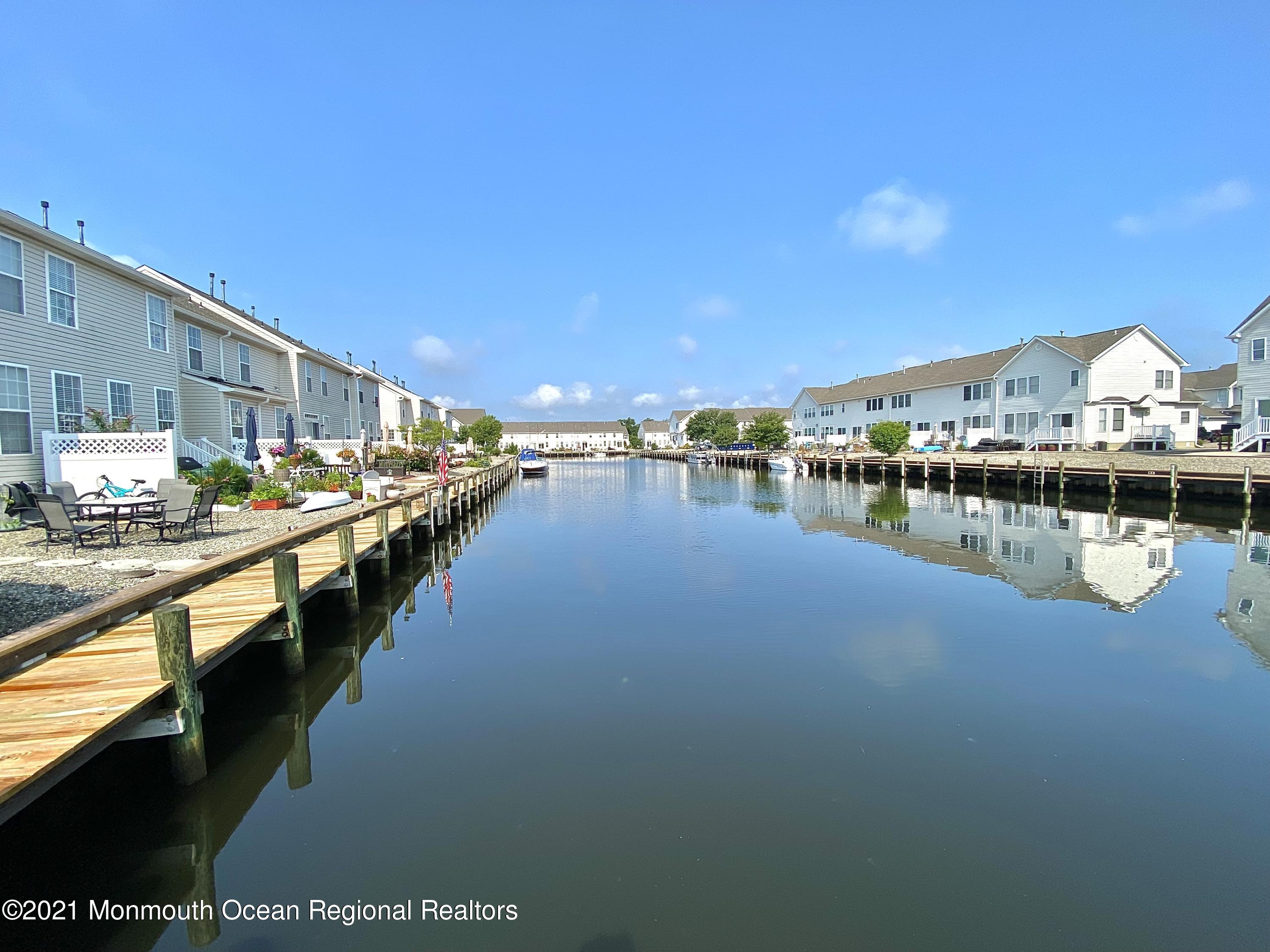 3 Skimmer Lane, Unit 38 Bayville, NJ 08721 - Photo 22 of 22 a view of a swimming pool and outdoor space