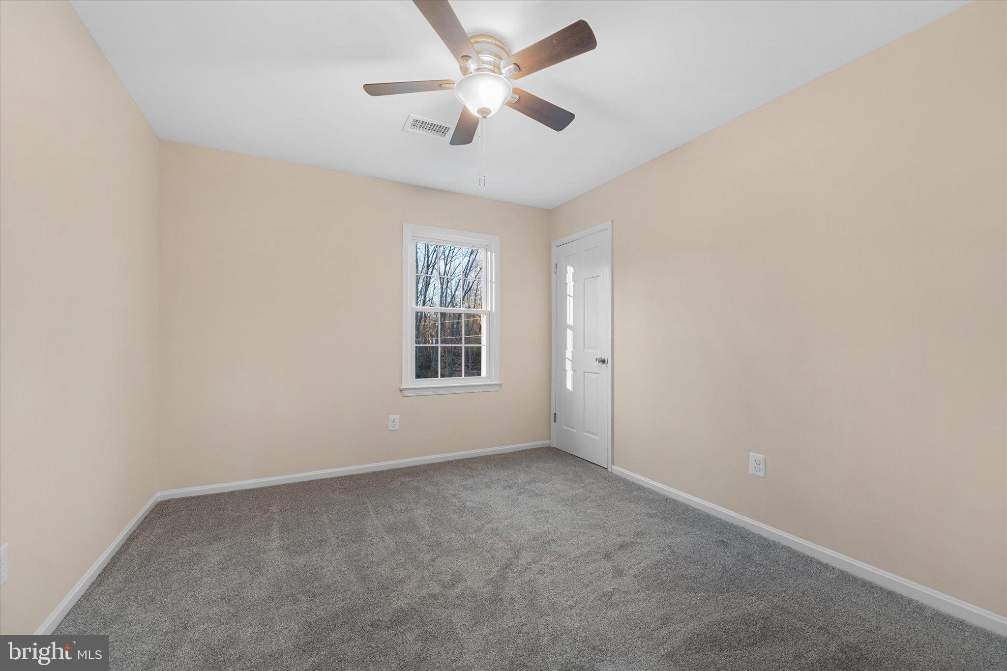 8016 Stillbrooke Road Manassas, VA 20112 - Photo 26 of 41 an empty room with windows and fan