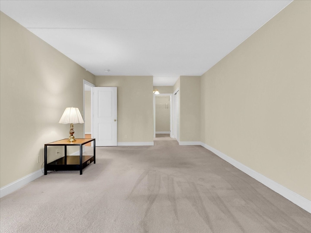 1500 Worcester Road, Unit 221 Framingham, MA 01702 - Photo 20 of 34 a view of a livingroom with furniture