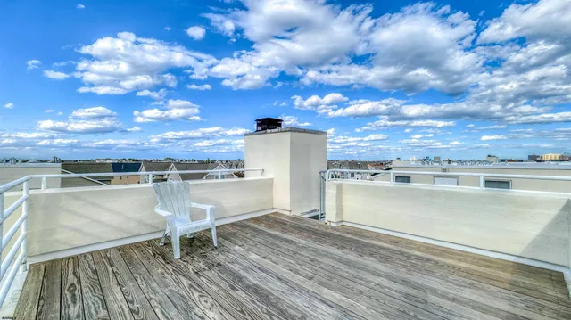 a view of a balcony with an outdoor space