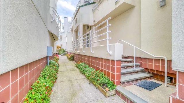 a view of a swimming pool with a lounge chairs