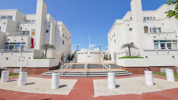 swimming pool view with tall buildings