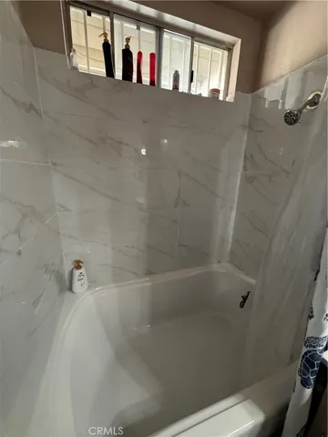 a bathroom with a bathtub