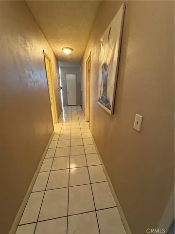 a bathroom with a shower and a mirror