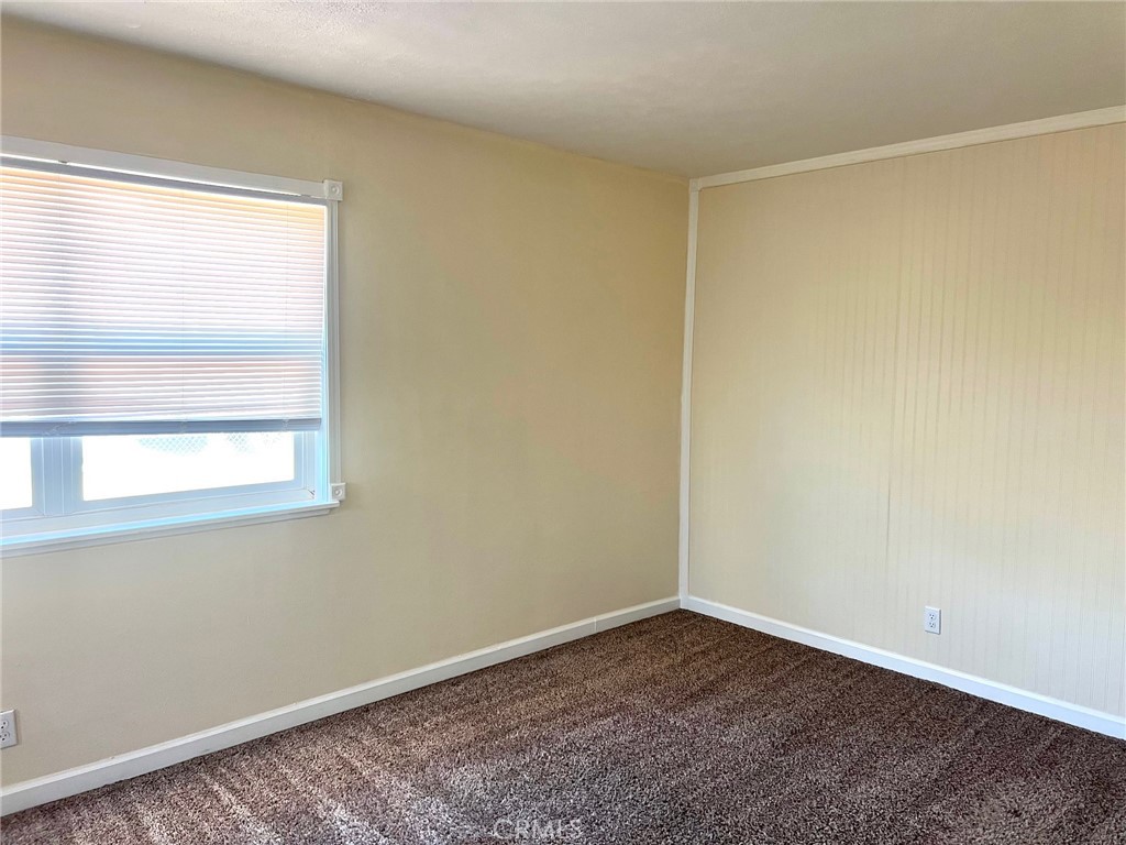 1550 Primrose Avenue Merced, CA 95340 - Photo 23 of 46 a view of an empty room with a window