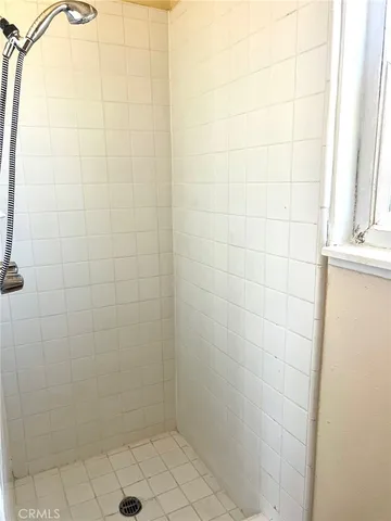 a swimming pool with outdoor seating and yard