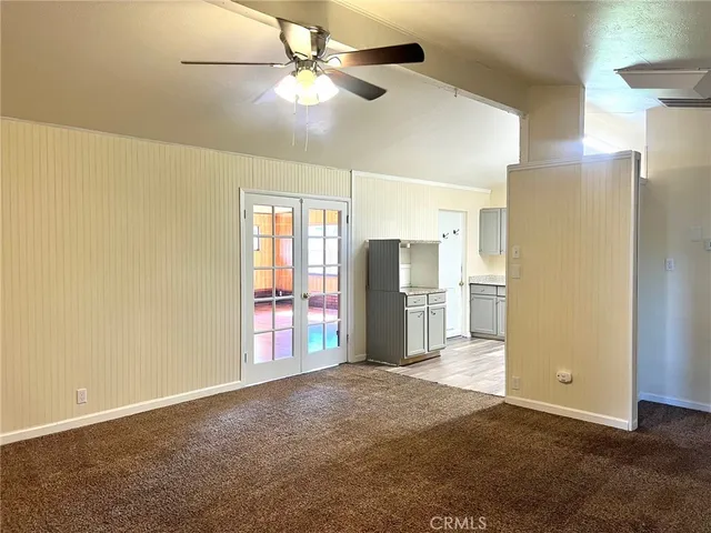 a view of a kitchen with furniture and a fireplace
