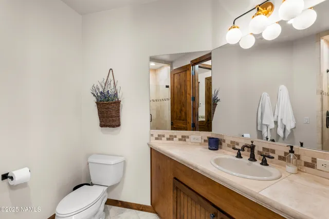 a bathroom with a shower and a tub