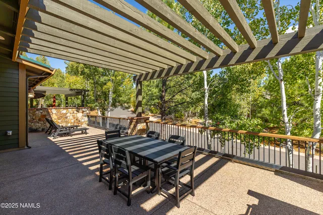 a view of balcony with wooden floor