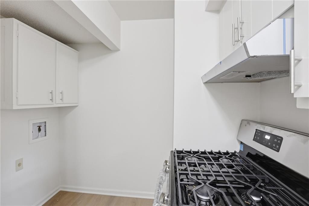 413 Promenade Court Marietta, GA 30064 - Photo 10 of 28 a room with storage and utility