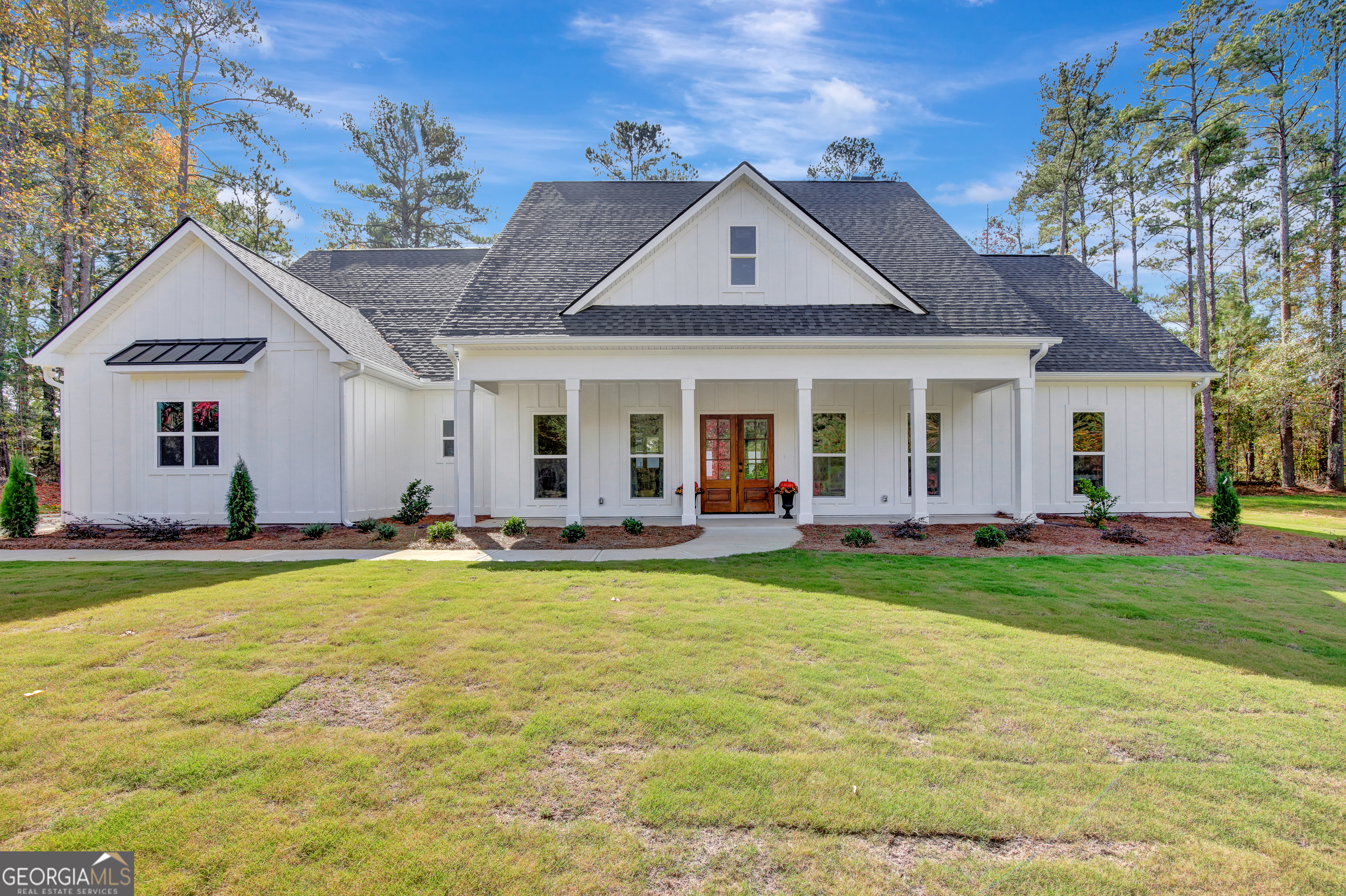 1001 Farmington Road Griffin, GA 30224 - Photo 1 of 1 a front view of a house with swimming pool having outdoor seating