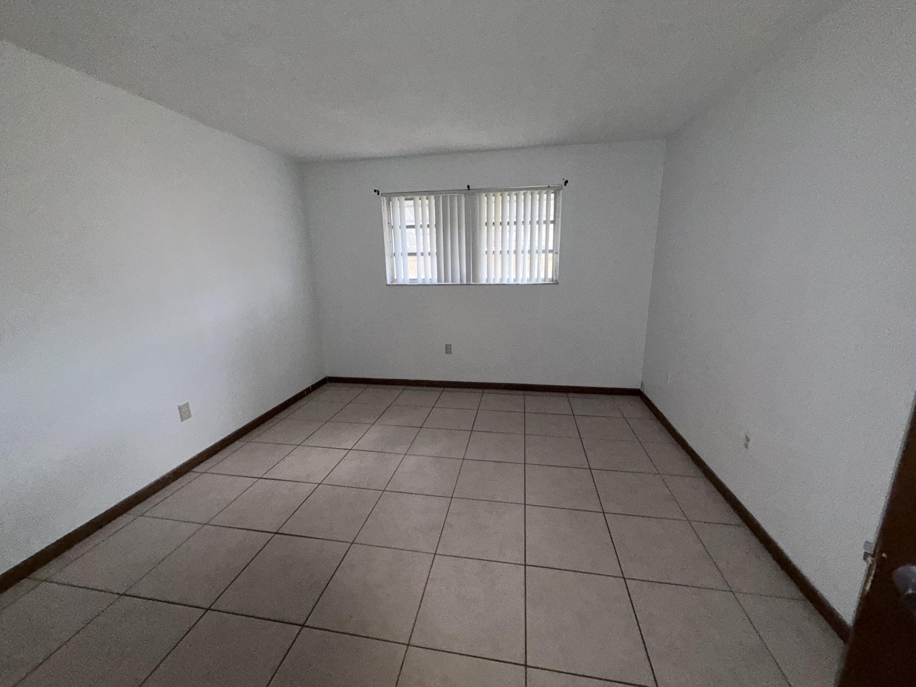 6050 Southwest 27th Street Miramar, FL 33023 - Photo 15 of 40 a view of an empty room and window