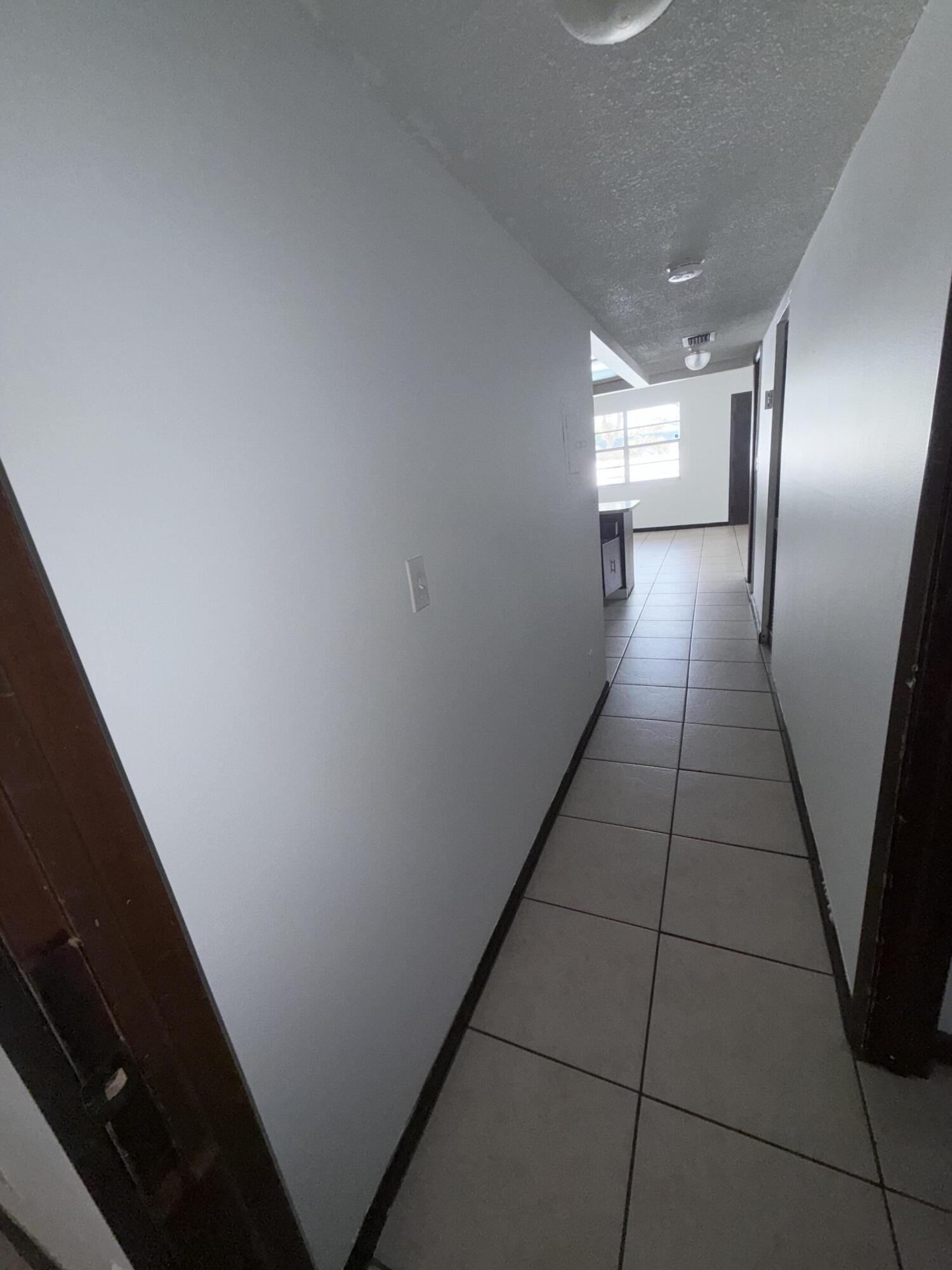 6050 Southwest 27th Street Miramar, FL 33023 - Photo 22 of 40 a view of gallery with wooden floor