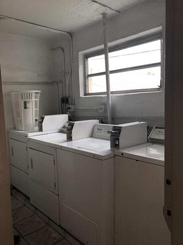 6050 Southwest 27th Street Miramar, FL 33023 - Photo 29 of 40 a bathroom with a sink and a mirror