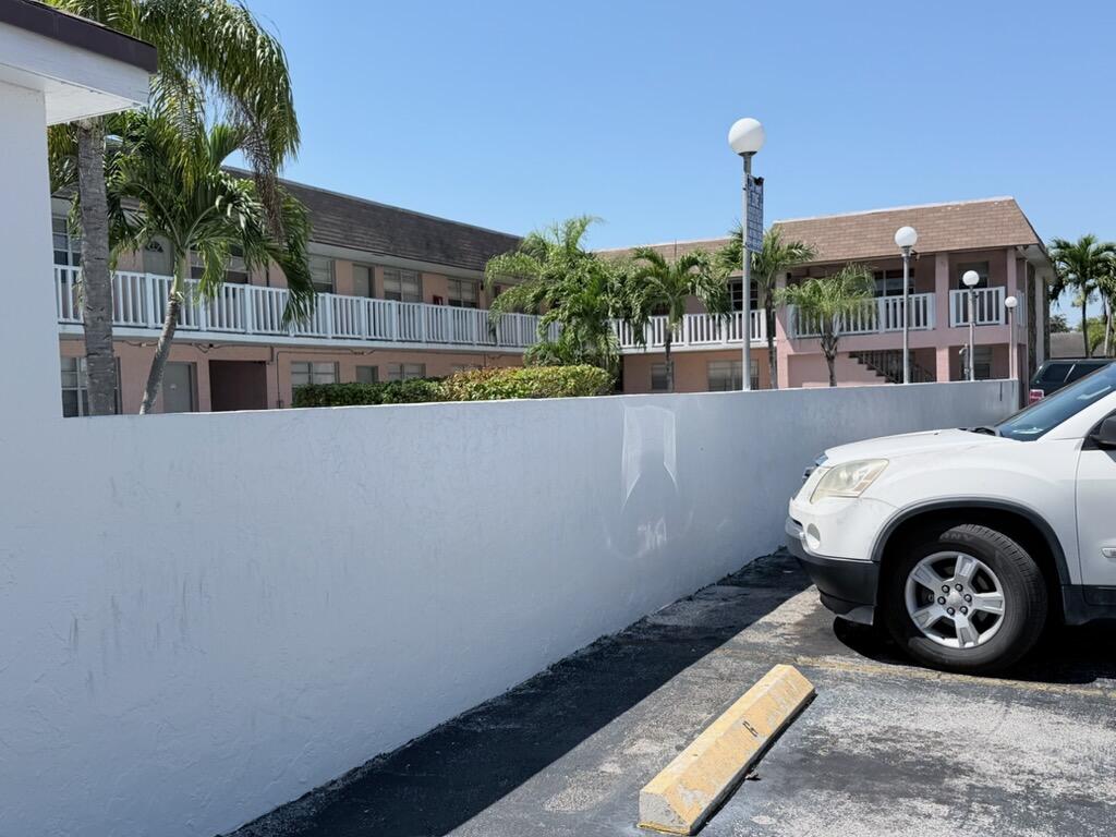 6050 Southwest 27th Street Miramar, FL 33023 - Photo 33 of 40 a front view of a house with parking space