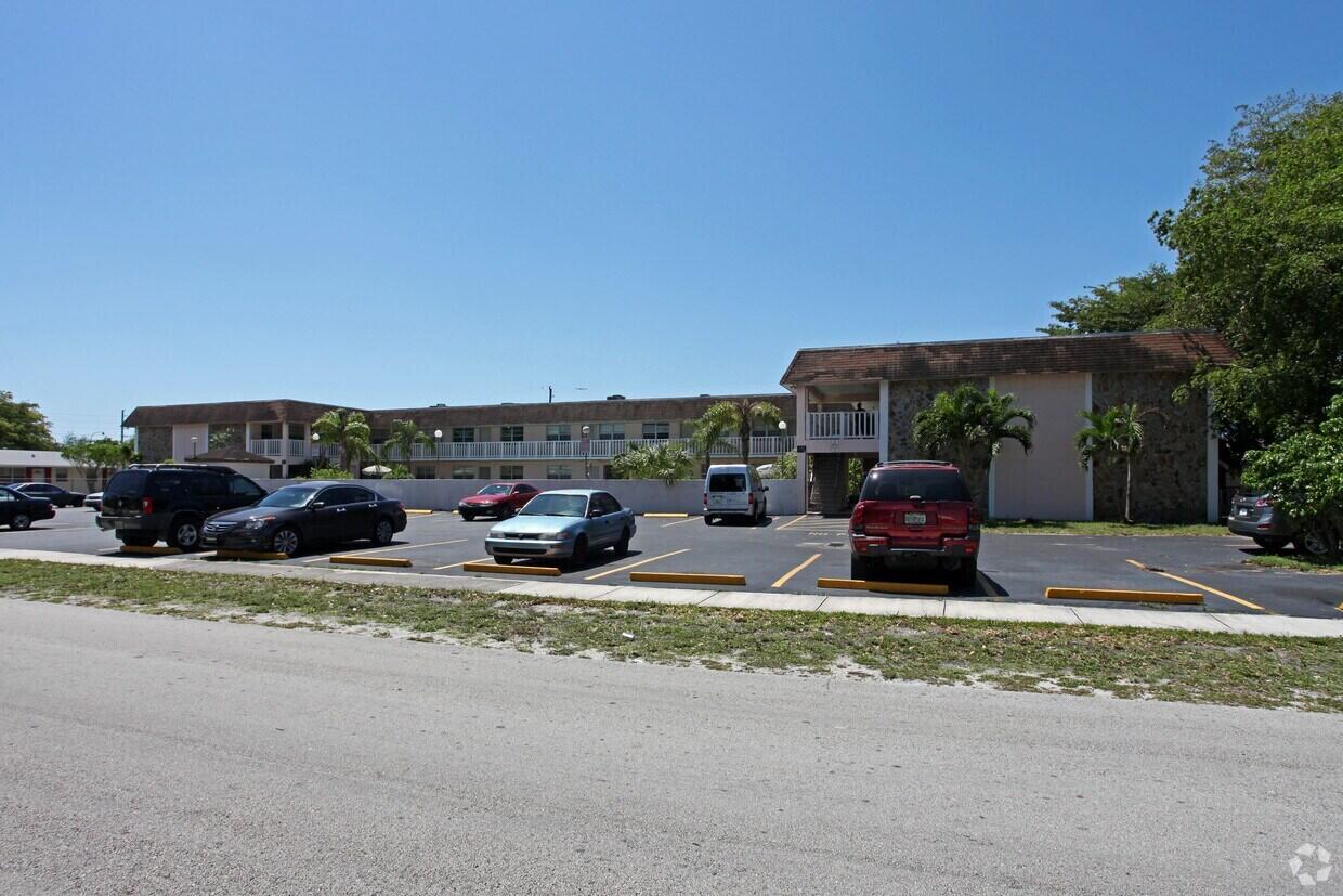 6050 Southwest 27th Street Miramar, FL 33023 - Photo 4 of 40 a view of street with parked cars